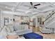 Open-concept design with a modern kitchen and a living area with coffered ceilings at 1297 Conway Rd, Decatur, GA 30030