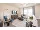 Bright living room with comfortable seating, modern decor, and large windows offering natural light at 3564 Shore Wood Ave, Lawrenceville, GA 30044