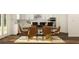 Bright dining room featuring a large wooden table, seating for six, and modern lighting at 416 Valley View Trl, Canton, GA 30115