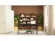 Charming home office space with desk, shelving, decor, natural light, and decorative rug at 416 Valley View Trl, Canton, GA 30115