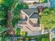 Birds eye view of roof with surrounding landscaping and concrete driveway at 4295 Cami Way, Buford, GA 30519