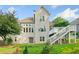 Exterior backyard featuring a deck, steps, and a gray exterior with green grass at 4295 Cami Way, Buford, GA 30519