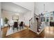 Elegant dining room with stylish furnishings and hardwood flooring leading to staircase at 4295 Cami Way, Buford, GA 30519