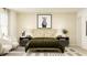 Cozy bedroom featuring a horse art piece, side tables with lamps and armchairs at 243 Deer Valley Run, Canton, GA 30115