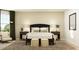 Bedroom with a black headboard, two side tables, a window, and neutral-toned walls at 243 Deer Valley Run, Canton, GA 30115