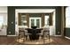 Inviting dining room with dark accent wall, seating six, with natural lighting at 243 Deer Valley Run, Canton, GA 30115