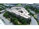 Overhead view of the property, showcasing its layout, surrounding greenery, and proximity to the neighborhood at 390 17Th Nw St # 2040, Atlanta, GA 30363