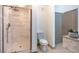 Contemporary bathroom featuring a glass-enclosed shower with marble tiling and modern fixtures at 390 17Th Nw St # 2040, Atlanta, GA 30363