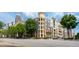 Exterior shot of condo in the city with street view and landscaping at 390 17Th Nw St # 2040, Atlanta, GA 30363