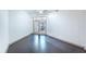 Bright living room with hardwood floors and access to a balcony at 390 17Th Nw St # 2040, Atlanta, GA 30363