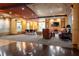 A comfortable community lounge area with seating, conference table, and modern decor at 390 17Th Nw St # 2040, Atlanta, GA 30363