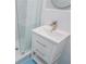 Modern bathroom with stylish vanity, shower, and vibrant tile at 6505 Whispering Ln, Atlanta, GA 30328