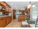 Spacious kitchen featuring tile floors, modern appliances, and a breakfast nook at 6505 Whispering Ln, Atlanta, GA 30328