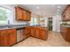Well-lit kitchen featuring granite countertops, stainless steel appliances, and ample cabinetry at 6505 Whispering Ln, Atlanta, GA 30328