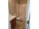 Bathroom with a wood vanity and shower-tub combo at 1752 Spring Hill Cv, Lithonia, GA 30058