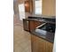 Kitchen with stainless steel appliances, granite countertops and wooden cabinetry at 1752 Spring Hill Cv, Lithonia, GA 30058