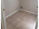 Laundry room features tile flooring and washer and dryer hookups at 1752 Spring Hill Cv, Lithonia, GA 30058