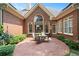 Brick patio perfect for outdoor dining and relaxing with mature garden at 2324 Littlebrooke Ln, Dunwoody, GA 30338