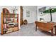 Cozy basement area featuring a bookshelf filled with books and eclectic decor at 310 Medridge Dr, Alpharetta, GA 30022