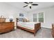 Cozy bedroom with natural light, soft carpet, and window views at 310 Medridge Dr, Alpharetta, GA 30022