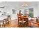Bright breakfast nook featuring hardwood floors and plenty of natural light at 310 Medridge Dr, Alpharetta, GA 30022