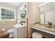 Bathroom featuring a vanity with granite countertops and natural light at 1120 Starline Se Dr, Smyrna, GA 30080