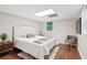 Cozy bedroom featuring neutral decor, natural light, and hardwood floors at 1120 Starline Se Dr, Smyrna, GA 30080