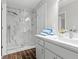 This bright, well-appointed bathroom features a glass-enclosed shower and elegant fixtures at 1143 Mcgarity Rd, Mcdonough, GA 30252