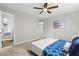 An open-concept bedroom with bright colors and a door leading to another room exudes comfort at 1143 Mcgarity Rd, Mcdonough, GA 30252