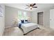 A comfortably designed bedroom with natural light and an accessible closet awaits at 1143 Mcgarity Rd, Mcdonough, GA 30252
