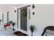 Inviting front porch with stylish decor and a welcoming entrance at 1143 Mcgarity Rd, Mcdonough, GA 30252