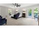 Spacious main bedroom boasts plush carpet, natural light, and access to an outdoor balcony at 1143 Mcgarity Rd, Mcdonough, GA 30252