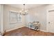 Bright dining room features hardwood floors, modern lighting, and a stylish serving bar, perfect for entertaining guests at 1336 Mcclelland Ave, Atlanta, GA 30344