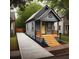 Cozy home featuring a welcoming porch with wooden accents and steps up to the front door at 1336 Mcclelland Ave, Atlanta, GA 30344