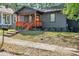 Charming home with a welcoming front porch and steps leading to the front door at 1336 Mcclelland Ave, Atlanta, GA 30344