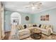 Comfortable living room featuring a sectional couch and view of the kitchen at 2567 Briers North Dr, Dunwoody, GA 30360