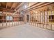 Unfinished basement with wooden framing, perfect for creating your dream space at 2682 Varner Dr, Atlanta, GA 30345