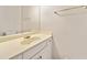 Bathroom showcasing a vanity with a sink, a mirror, and sconce lighting at 2682 Varner Dr, Atlanta, GA 30345