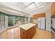 Eat-in kitchen with island, stainless appliances, and access to a lovely outdoor deck at 2682 Varner Dr, Atlanta, GA 30345