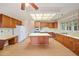 Well-lit kitchen features an island, ample counter space, and stylish wood cabinetry at 2682 Varner Dr, Atlanta, GA 30345