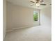 Bright bedroom with a ceiling fan and a large window offering natural light at 4650 Pleasant Woods Dr, Cumming, GA 30028