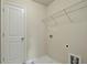 Efficient laundry room featuring a wire rack shelf and convenient hookups at 4650 Pleasant Woods Dr, Cumming, GA 30028