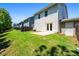 Well-maintained backyard with green grass, patio, and privacy fence at 118 Woodhouse Cir, Acworth, GA 30102
