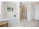 Bathroom featuring a soaking tub and a glass-enclosed shower at 118 Woodhouse Cir, Acworth, GA 30102