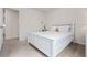 Neutral bedroom with white furniture, carpet, and natural light from the window at 118 Woodhouse Cir, Acworth, GA 30102