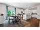 Bright dining area with a breakfast bar that overlooks the open kitchen at 118 Woodhouse Cir, Acworth, GA 30102