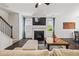 Inviting living room featuring a fireplace and an American flag decor at 118 Woodhouse Cir, Acworth, GA 30102