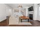 Spacious living room showcasing hardwood floors and a staircase at 118 Woodhouse Cir, Acworth, GA 30102