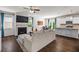 Cozy living room with a fireplace, hardwood floors, and open floor plan at 118 Woodhouse Cir, Acworth, GA 30102