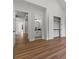 Bedroom featuring hardwood floors, a closet, and an ensuite bathroom with modern fixtures at 1604 Greendale Rd, Covington, GA 30014